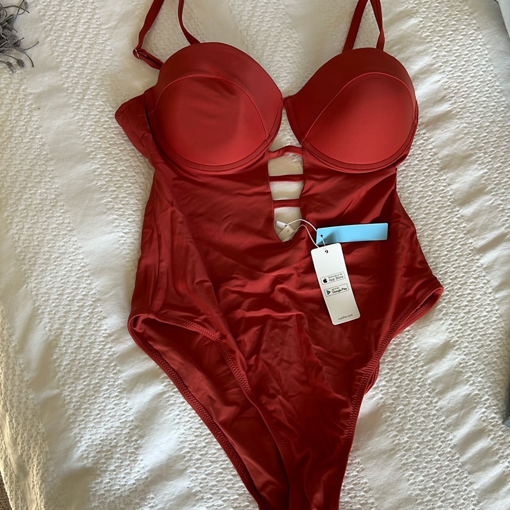 Never worn one piece